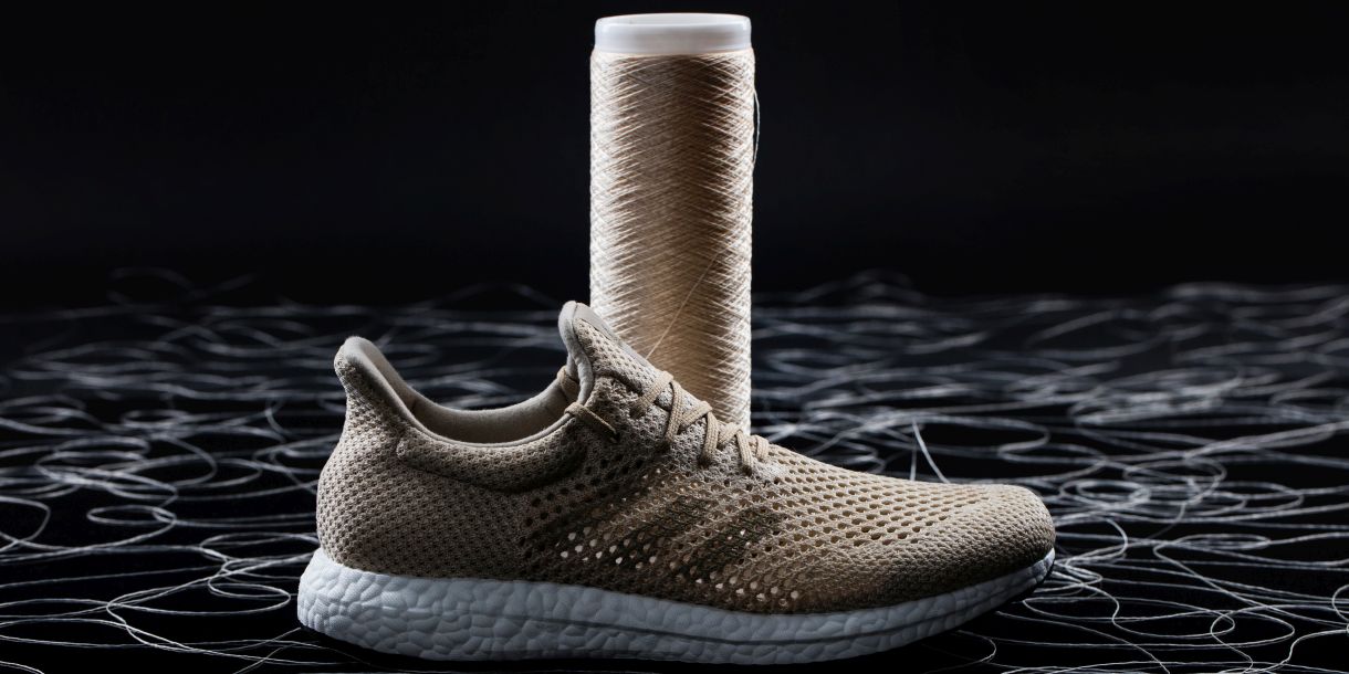Sneaker and spool of thread produced from spider silk